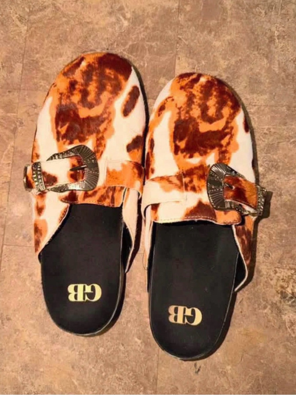 Gianni Bini Cowhide-Print Buckle Slip-On Mules in Brown & White